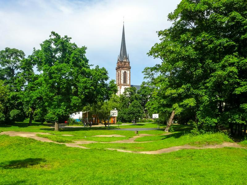 Escort Wiesbaden - Green park with church in the background Escort Wiesbaden - Green park with church in the background